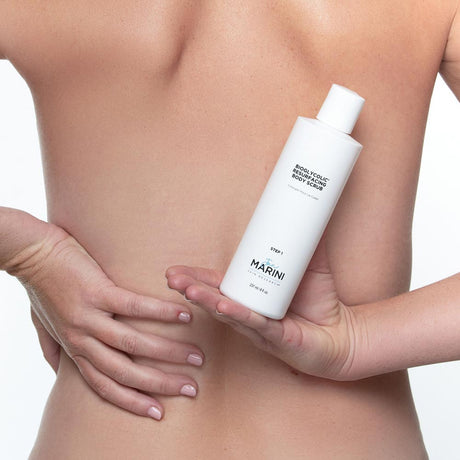 Jan Marini Body Resurfacing Scrub bottle and model's back