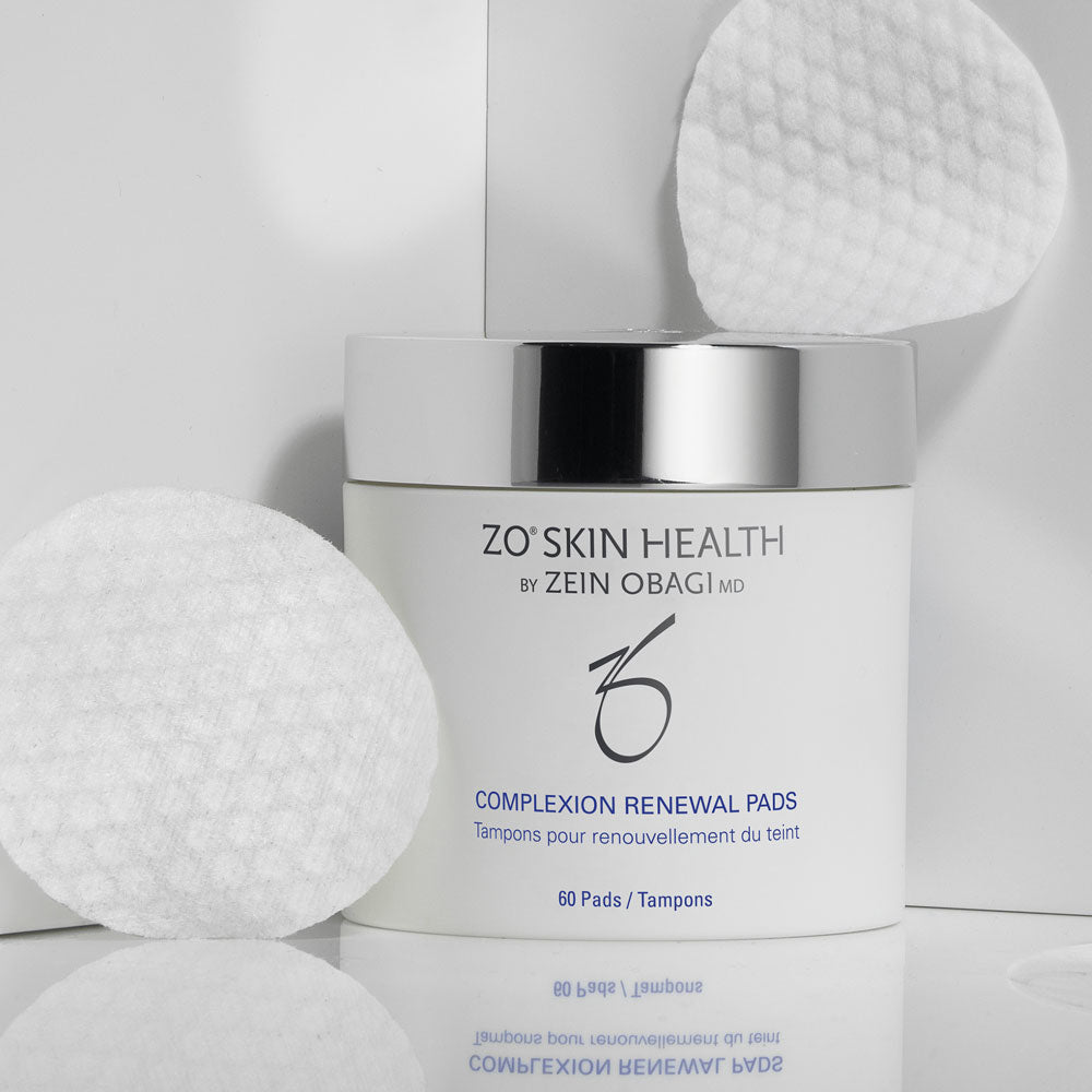 Complexion Renewal Pads with pads in a gray background
